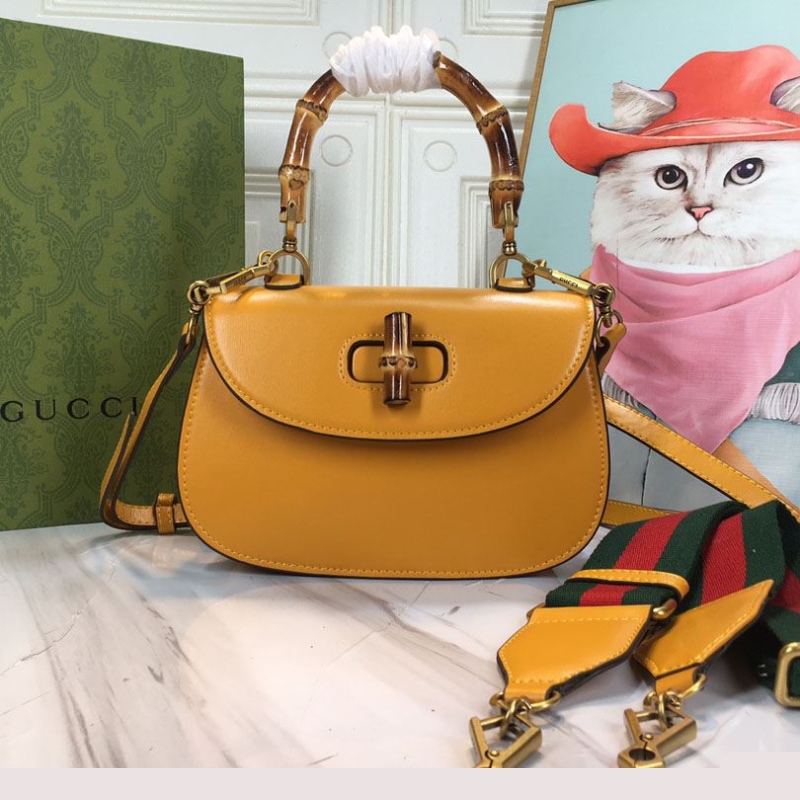 G*u*i top handle bags